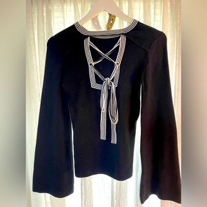 Ladies black bell sleeve sweater